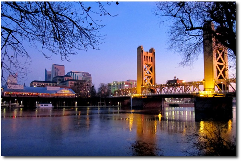 Old Sacramento and City Skyline from Riverwalk at Dusk